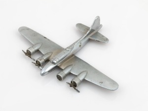 Trench Art: Boeing B-17 Flying Fortress, c. 1940s, solid chrome-plated brass, 25cm wingtip to wingtip.