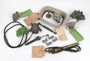An accumulation of fourteen early aircraft parts, including two Tiger Moth luggage clamps. (14+ items)