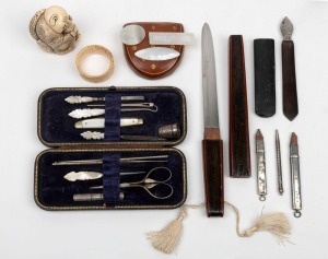 An antique manicure set, paper knife, reproduction Chinese figure, ivory napkin ring, lancing blade, etc, (qty)