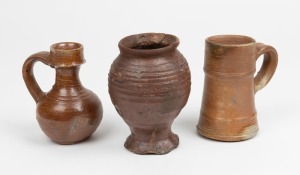 Three antique Dutch stoneware vessels, 15th and 16th century, the largest 13cm high
