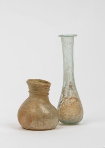 Two antique Roman glass unguentarium vessels, 5cm and 10cm high