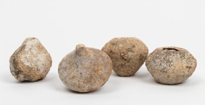 Four antique Roman spinning whorls, 1st century A.D., with accompanying collection documentation, the largest 8cm high