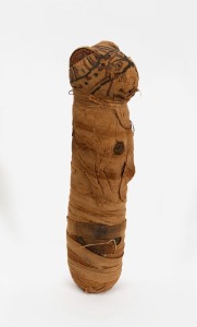 An Egyptian mummified cat, 25cm high