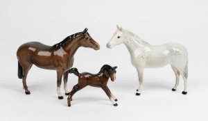 BESWICK group of three English porcelain horse statues, all with black factory mark to base, the largest 14cm high