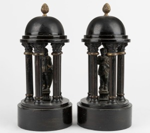 A pair of antique black slate and cast spelter garnitures, 19th century, 25cm high