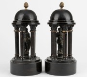 A pair of antique black slate and cast spelter garnitures, 19th century, 25cm high