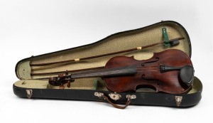 An antique European violin bearing paper label, in case with two bows