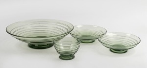 WHITEFRIARS&nbsp;four English sea green glass footed bowls with ribbon trail decoration, mid 20th century, the largest 31cm diameter