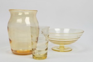 WHITEFRIARS English golden amber glass ribbed vase, tumbler and a footed bowl, mid 20th century, (3 items), the vase 23cm high