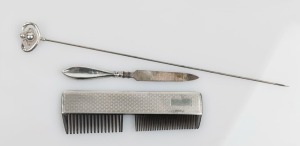 An antique engine decorated sterling silver comb, an antique silver nail file and a sterling silver Art Nouveau hatpin by Charles Horner, 19th and 20th century, (3 items), all bearing Chester hallmarks, the hatpin 22cm long