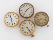 Four assorted travelling clocks, all with eight day movements, three American, one Swiss, 20th century, the largest 8cm high including crown