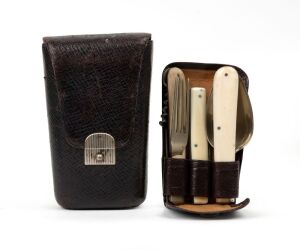 An antique folding campaign cutlery and glass set in original leather wallet, 19th/20th century, 13cm high when closed