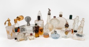 Nineteen assorted perfume bottles and atomizers including novelty figural examples, the largest 17cm high