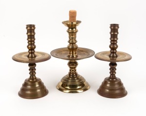 Three assorted turned brass ecclesiastical candlesticks, 19th/20th century, the largest 29cm high