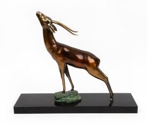 An Art Deco&nbsp;cast bronze statue of an antelope mounted on black slate base, circa 1930, signed "P. Loys", 38cm high, 46cm wide
