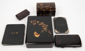 A vintage leather vanity case, a tortoiseshell casket, cigarette case and snuff box, a Japanese lacquer box and two vintage leather purses including one with sterling silver mounts, 19th and 20th century, (7 items), the case 30cm wide