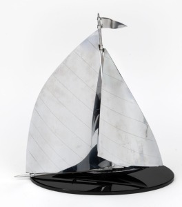 An Art Deco chrome yacht ornament on black glass base, circa 1930, 36cm high