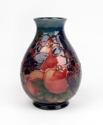 MOORCROFT&nbsp;"Finch and Berry" pottery vase on blue ground, stamped "Moorcroft, Made In England, W.M.", 19cm high