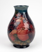 MOORCROFT&nbsp;"Finch and Berry" pottery vase on blue ground, stamped "Moorcroft, Made In England, W.M.", 19cm high - 2