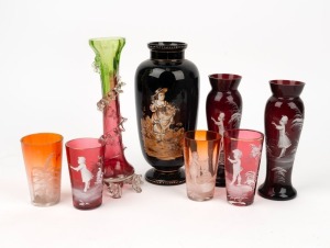 MARY GREGORY pair of ruby glass vases; together with four assorted Mary Gregory beakers and two antique English glass vases including one with enamel decoration, mixed condition, 19th century, (8 items), the largest 22cm high