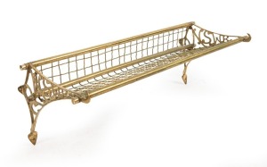 A reproduction brass railway luggage rack, 20th century, 73cm wide