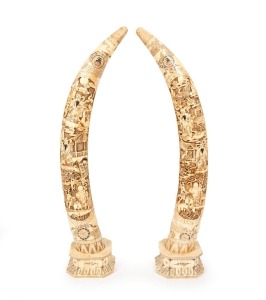 A pair of carved bone ornaments, 20th century, 86cm high