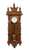 An antique German made Vienna regulator wall clock in walnut case with split column decoration, two train&nbsp;eight day weight driven movement with Roman numerals and subsidiary seconds dial, 19th century, ​​​​​​​134cm high