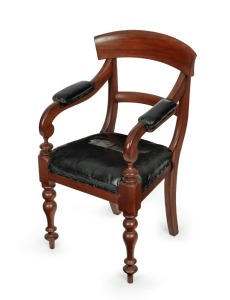 An Australian cedar spade back library chair with black leatherette upholstered seat and arms, New South Wales origin, 19th century, 53cm across the arms