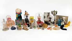Thirty assorted perfume bottles including JEAN PAUL GAULTIER, and advertising signs
