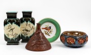 An Austrian pierced pottery bowl, a pair of French majolica mantle vases with bird and blossom decoration, a conical terracotta vase and an antique English green porcelain cabinet plate with hand-painted bird decoration, 19th and 20th century,&nbsp;(5 items), 