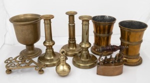 Antique brass candlesticks, brass weight, coal iron and trivet, mortar and pair of urns, 19th century, (9 items), the largest 19cm high