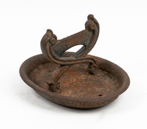 An antique cast iron boot scraper, 19th century, 20cm high