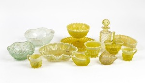 Assorted citrine pressed glass bowls, dishes, jugs, swan ornaments etc., 19th/20th century, (13 items), the largest 16cm high