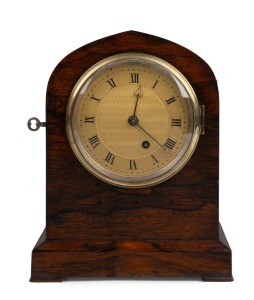 A fine antique English travelling timepiece in rosewood lancet case with chain fusee and superb engine turned gilt dial with fine heart shaped spade hands and Roman numerals, in the manner of the great English carriage clock manufacturers, circa 1840, 21cm high