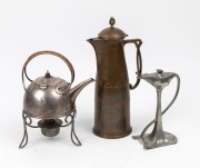 An antique silver plated Arts & Crafts spirit kettle on stand, together with a German pewter Art Nouveau table cigar lighter and a W.M.F. German copper water pot, 19th/20th century, (3 items). the largest 35cm high