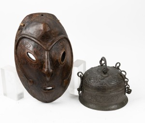 An African tribal mask, together with an Indo-Persian metal censer, (2 items), the mask 44cm high
