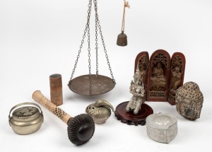 Assorted Asian and Pacific Islands artefacts including cast stone Buddha head, travelling Buddhist shrine, hanging scales, beetle nut pots, lime pots, Fijian ula, silver finished Buddha statue etc., 20th century, (qty)