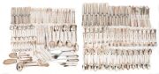 A sterling silver cutlery set for 12 places with a handsome selection of serving utensils to match, manufactured by Bruckmann, 20th century (186 pieces), stamped "Bruckmann&nbsp;Sterling Silver", silver weight (not including knives) 7088 grams