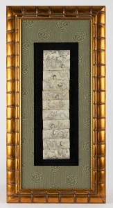 A Chinese bone display with carved dragon motif housed in gilt frame with silk mount, 20th century, 41 x 81cm overall