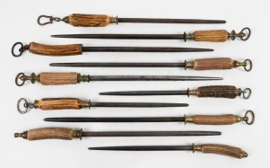 Ten assorted antique sharpening steels, all with horn handles, 19th century, the largest 59cm long