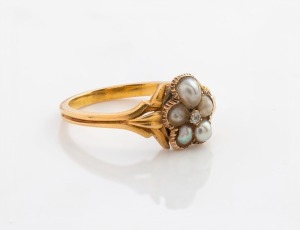 An antique 18ct gold ring, set with five seed pearls and white diamond, 19th century, 2.9 grams
