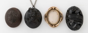 An antique jet brooch; together with two antique bog oak lockets and pendants and a pinchbeck mourning brooch, A/F, 19th century, (4 items)