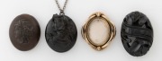 An&nbsp;antique jet brooch; together with two antique bog oak lockets and pendants and a pinchbeck mourning brooch, A/F, 19th century, (4 items)