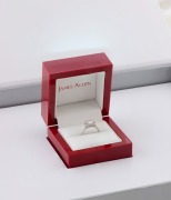 A platinum pav&eacute;&nbsp;halo engagement ring with impressive 1.26 carat central diamond (VVS2), (colour F), in original box of issue from James Allan Jewellers. "Excellent Round True Hearts and Arrows cut" the highest quality cut available with James Allen. This - 2