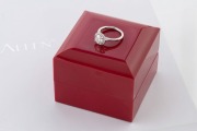 A platinum pav&eacute;&nbsp;halo engagement ring with impressive 1.26 carat central diamond (VVS2), (colour F), in original box of issue from James Allan Jewellers. "Excellent Round True Hearts and Arrows cut" the highest quality cut available with James Allen. This - 3