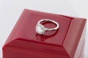 A platinum pav&eacute;&nbsp;halo engagement ring with impressive 1.26 carat central diamond (VVS2), (colour F), in original box of issue from James Allan Jewellers. "Excellent Round True Hearts and Arrows cut" the highest quality cut available with James Allen. This - 5