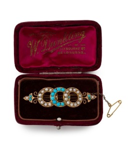 An antique Australian 18ct yellow gold brooch, set with rings of seed pearls and turquoise, housed in a scarlet plush fitted box retailed by W. DUNKLING of Melbourne, 19th century, 6cm wide, 11.4 grams