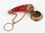 An antique ruby glass cornucopia chatelaine scent bottle with gilt metal mounts and original glass stopper, 19th century, 7cm long - 2