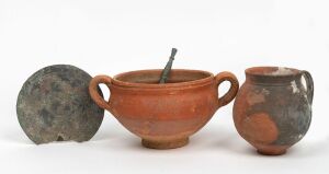 Roman bronze mirror (damaged); together with two pottery vessels&nbsp;(3 items), the mirror 19cm long