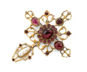 An impressive Medieval style 9ct gold cross pendant/brooch, set with garnets and pearls, custom made by SARGISONS of Hobart, 20th century, stamped "9ct", 9cm high, 22.91 grams total